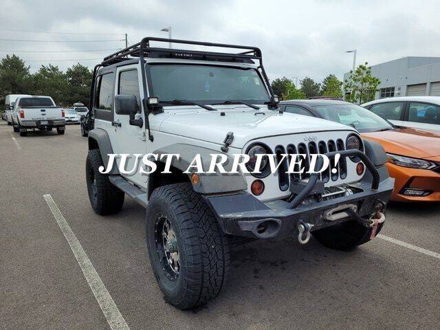 2012 Jeep Wrangler for sale at EMPIRE LAKEWOOD NISSAN in Lakewood CO