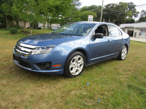 2010 Ford Fusion for sale at Triangle Auto Sales in Elgin IL