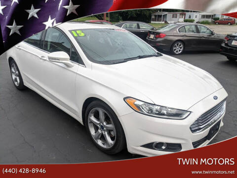 2015 Ford Fusion for sale at TWIN MOTORS in Madison OH