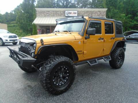 2014 Jeep Wrangler Unlimited for sale at Driven Pre-Owned in Lenoir NC