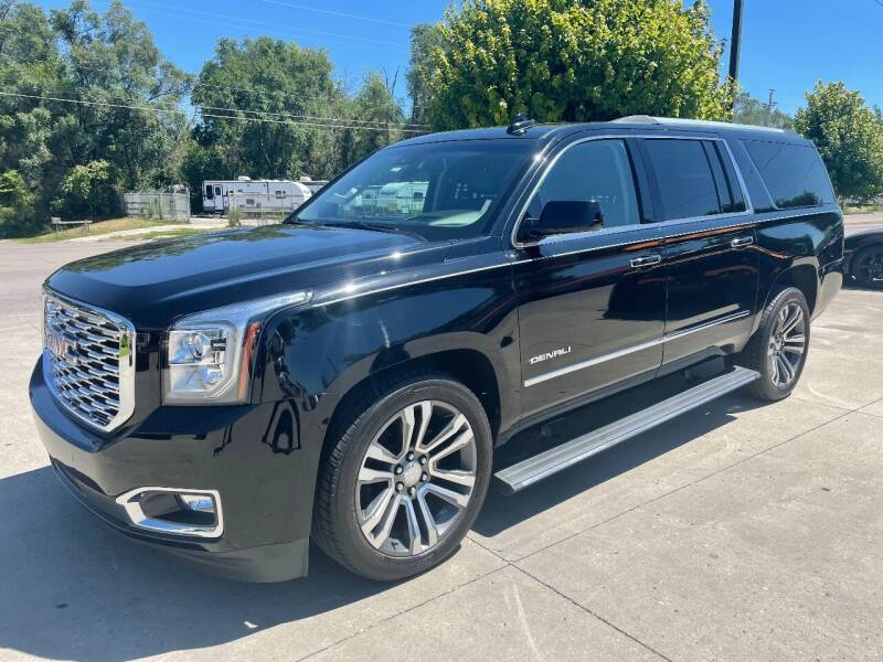 2018 GMC Yukon XL for sale at Azteca Auto Sales LLC in Des Moines IA