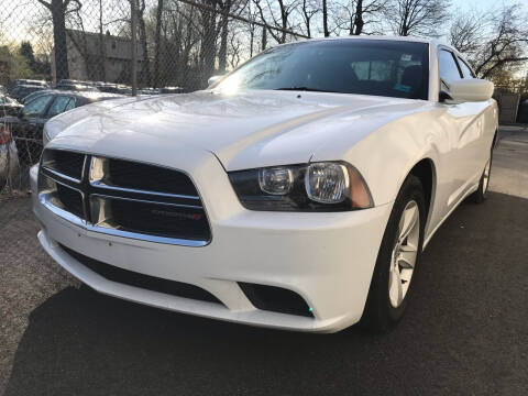 2014 Dodge Charger for sale at MAGIC AUTO SALES in Little Ferry NJ