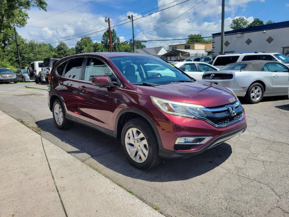 2016 Honda CR-V for sale at DAGO'S AUTO SALES LLC in Dalton, GA