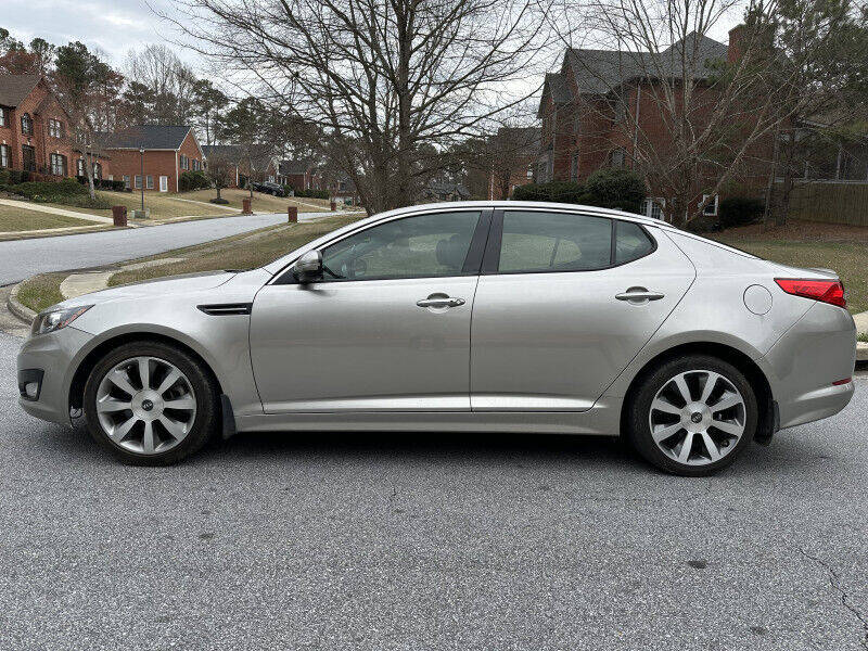 2013 Kia Optima for sale at SHURE AUTO SALES in Snellville, GA