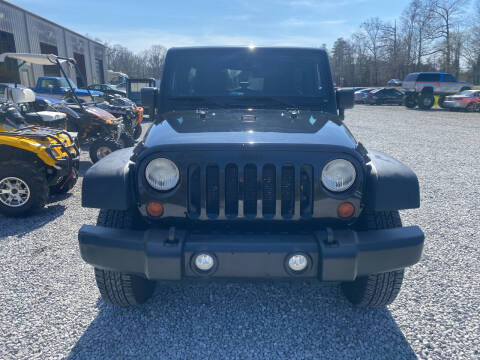 2013 Jeep Wrangler Unlimited for sale at Alpha Automotive in Odenville AL