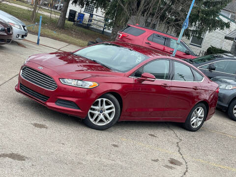 2014 Ford Fusion for sale at Exclusive Auto Group in Cleveland OH