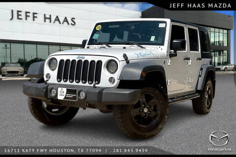 2015 Jeep Wrangler Unlimited for sale at JEFF HAAS MAZDA in Houston TX