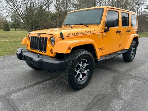 2012 Jeep Wrangler Unlimited for sale at Spooner Auto Sales in Flint MI