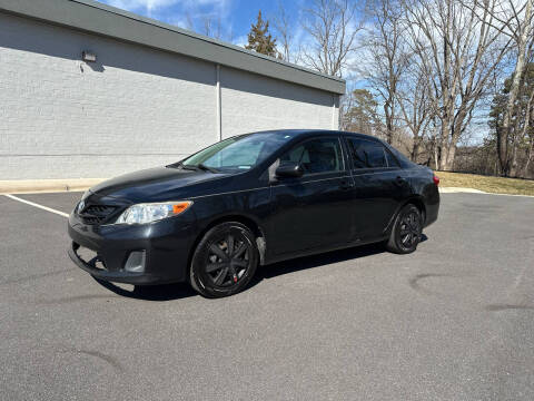 2011 Toyota Corolla for sale at Noble Auto in Hickory NC