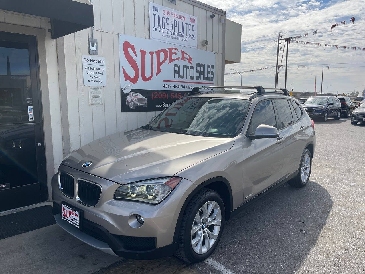 2014 BMW X1 for sale at Super Auto Sales Modesto in Modesto, CA