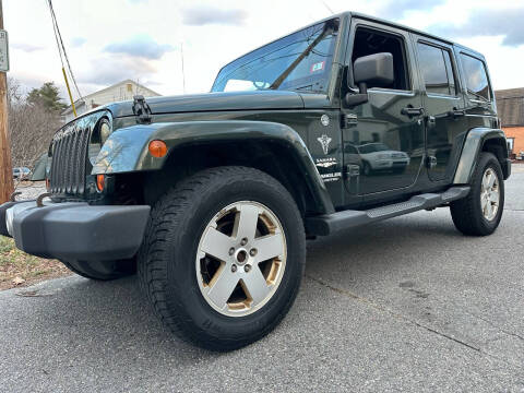 2011 Jeep Wrangler Unlimited for sale at iSellTrux in Hampstead NH