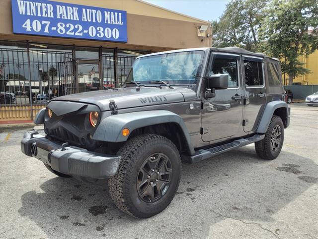 2016 Jeep Wrangler Unlimited for sale at Winter Park Auto Mall in Orlando, FL