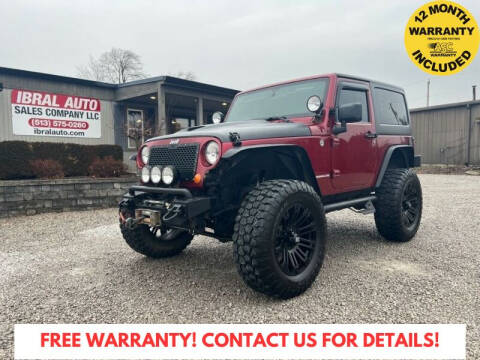 2012 Jeep Wrangler for sale at Ibral Auto in Milford OH