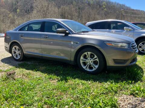 2014 Ford Taurus for sale at LEE'S USED CARS INC Morehead in Morehead KY