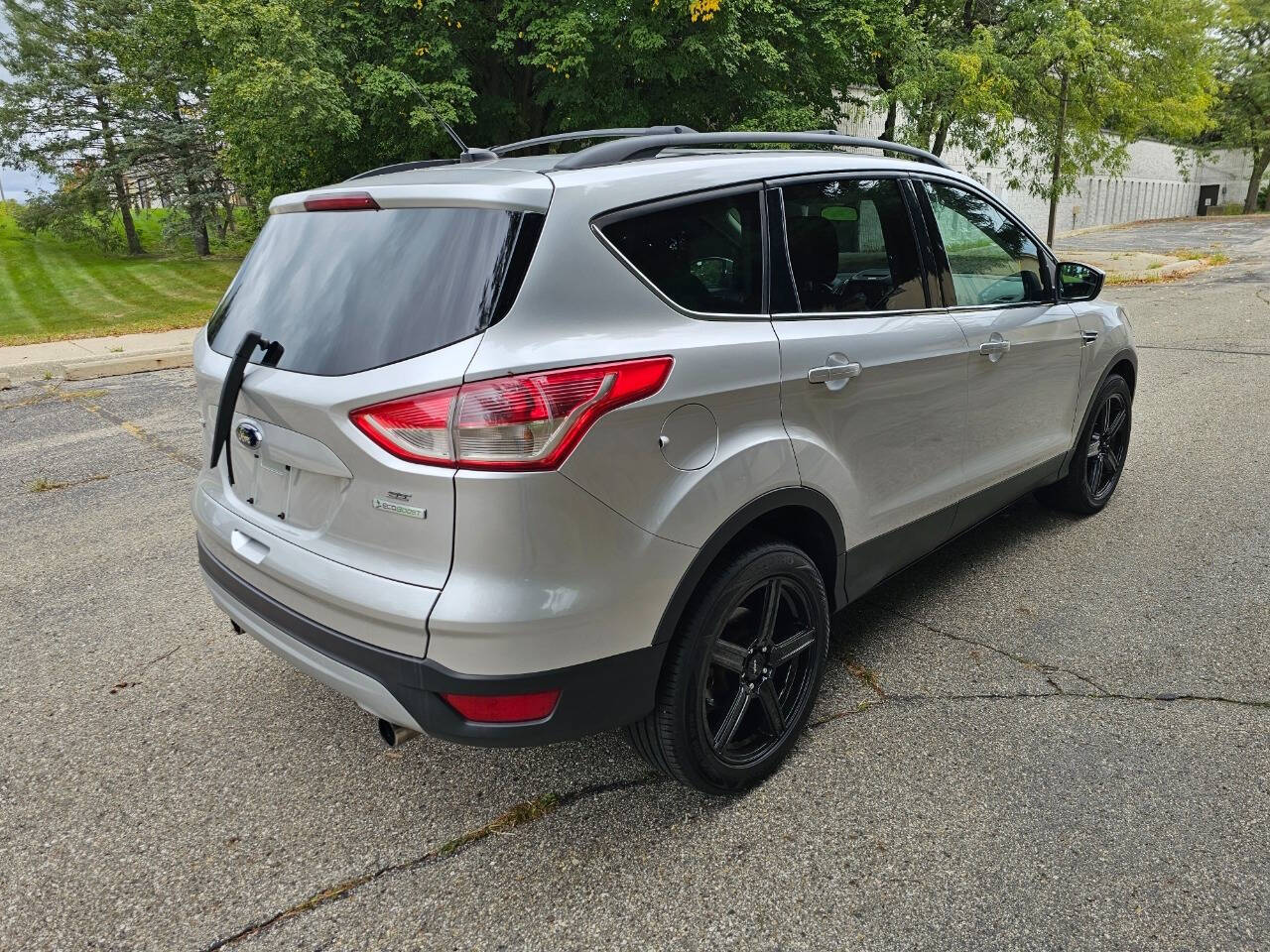 2013 Ford Escape for sale at WAGNER AUTO MART LLC in Ann Arbor, MI