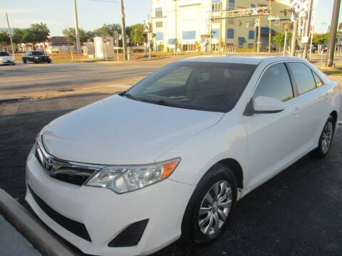 2012 Toyota Camry for sale at K & V AUTO SALES LLC in Hollywood FL