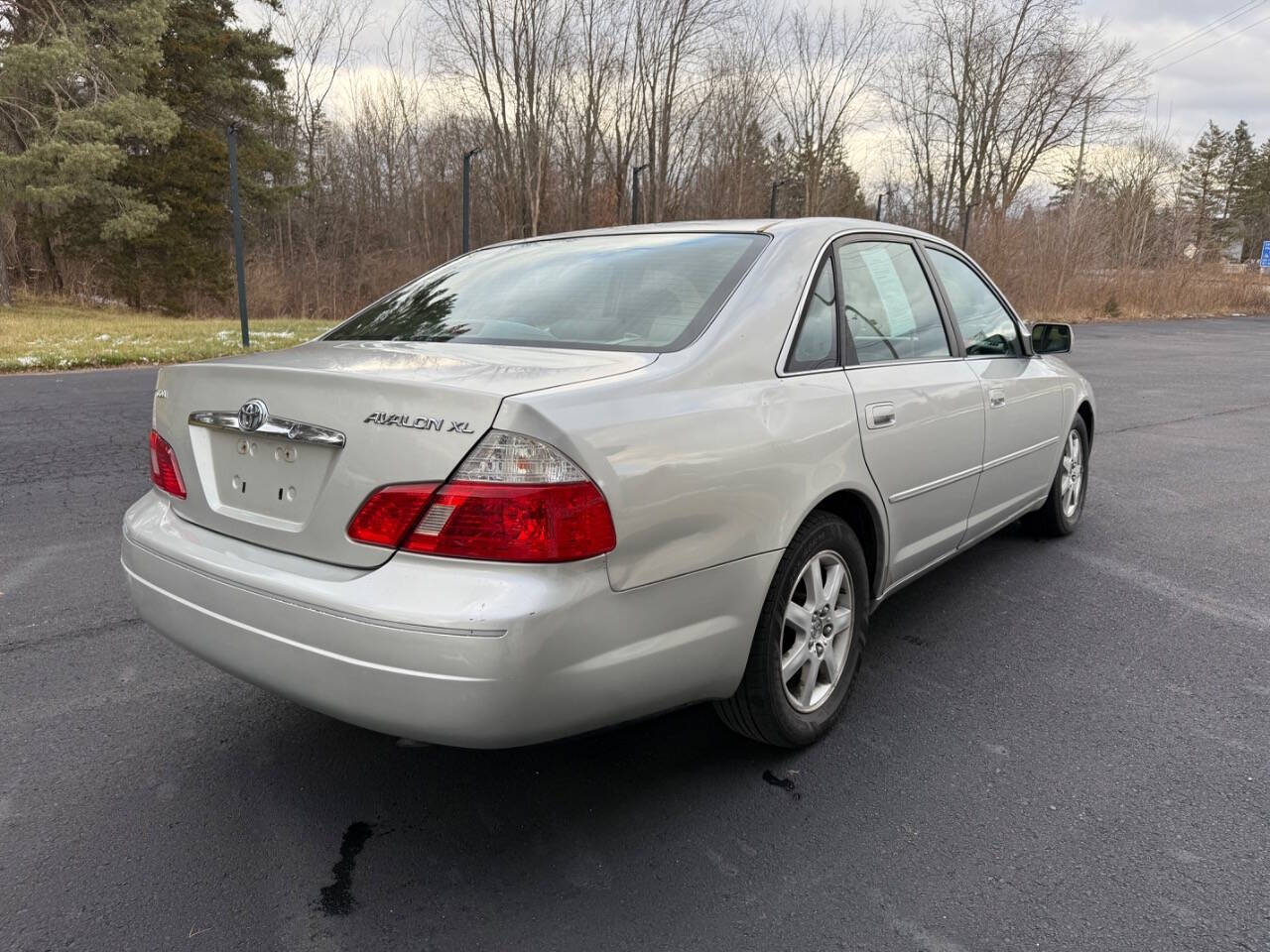 2003 Toyota Avalon for sale at Exclusive Auto Group of Michigan LLC in Lansing, MI