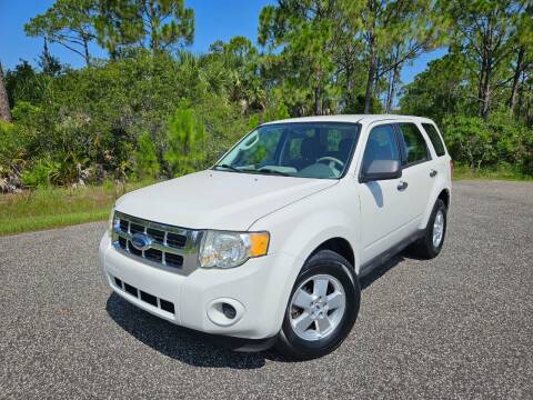 2009 Ford Escape for sale at VICTORY LANE AUTO SALES in Port Richey FL