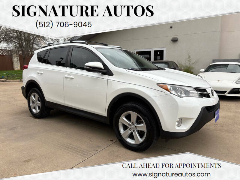 2013 Toyota RAV4 for sale at Signature Autos in Austin TX