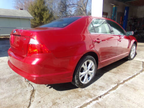 2012 Ford Fusion for sale at English Autos in Grove City PA