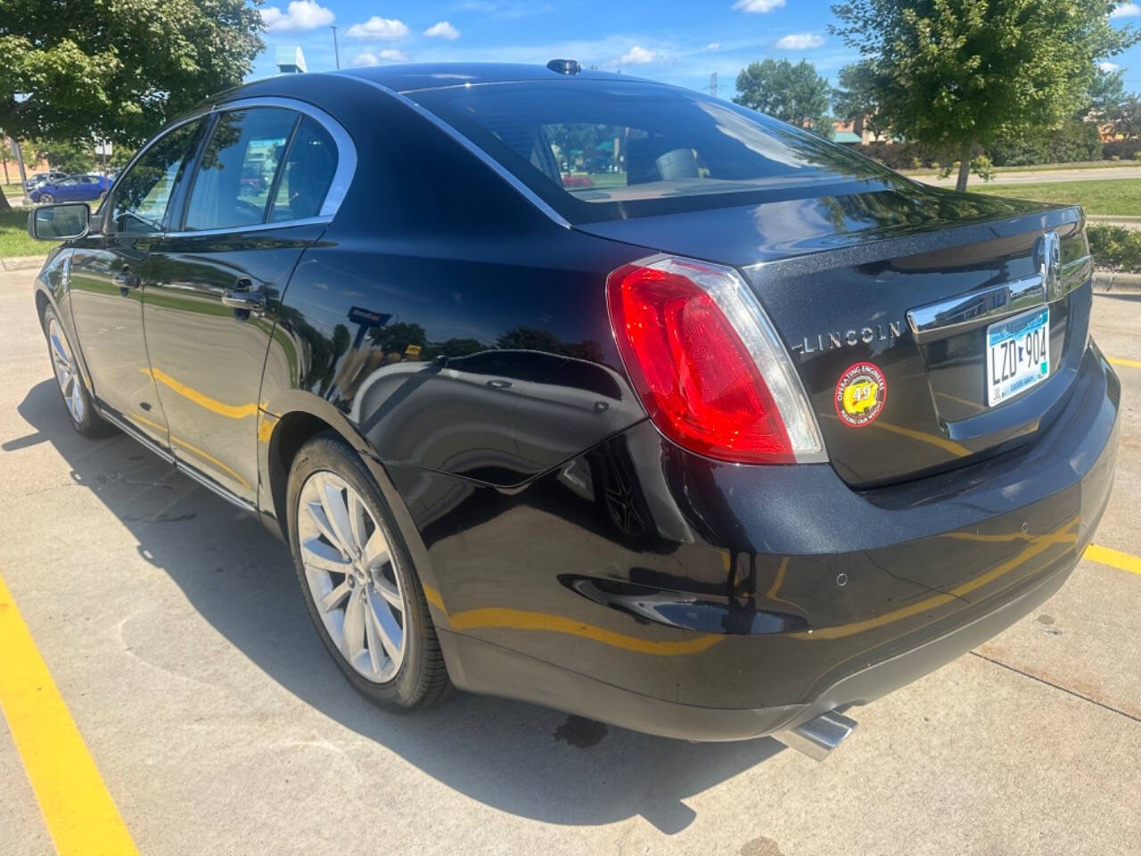 2011 Lincoln MKS for sale at JUST AUTOS in MINNEAPOLIS, MN