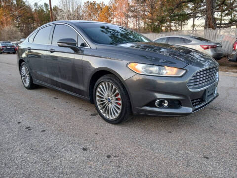 2015 Ford Fusion for sale at Mandingo's Automotive & Sales LLC in Snellville GA