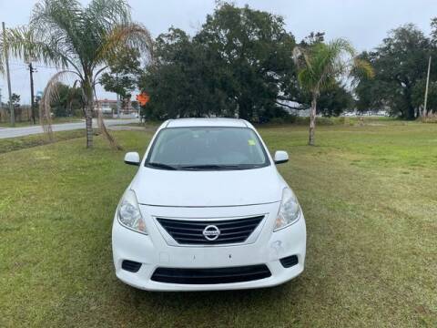 2014 Nissan Versa for sale at AM Auto Sales in Orlando FL
