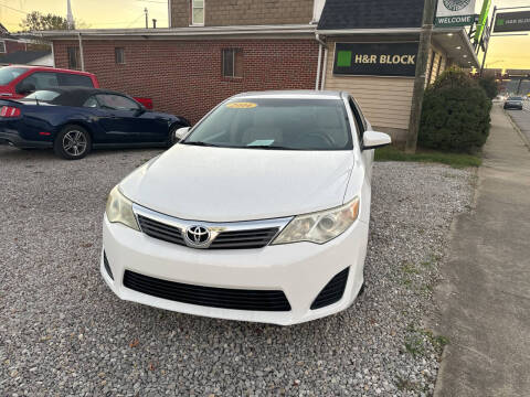 2014 Toyota Camry for sale at ADKINS PRE OWNED CARS LLC in Kenova WV