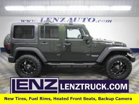 2011 Jeep Wrangler Unlimited for sale at LENZ TRUCK CENTER in Fond Du Lac WI