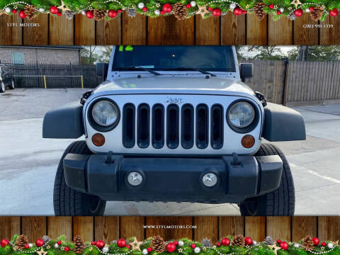 2012 Jeep Wrangler Unlimited for sale at STYL MOTORS in Pasadena TX