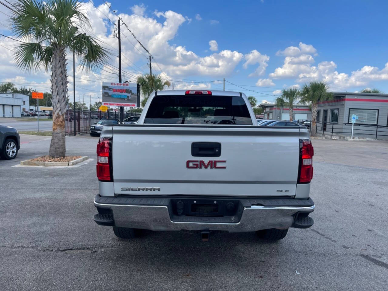 2015 GMC Sierra 1500 for sale at SMART CHOICE AUTO in Pasadena, TX