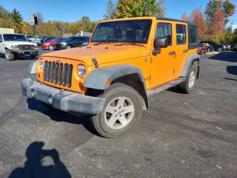 2012 Jeep Wrangler Unlimited for sale at Cruisin' Auto Sales in Madison IN