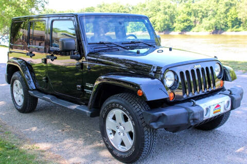 2011 Jeep Wrangler Unlimited for sale at Auto House Superstore in Terre Haute IN