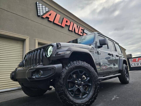 2021 Jeep Wrangler Unlimited for sale at Alpine Motors Certified Pre-Owned in Wantagh NY