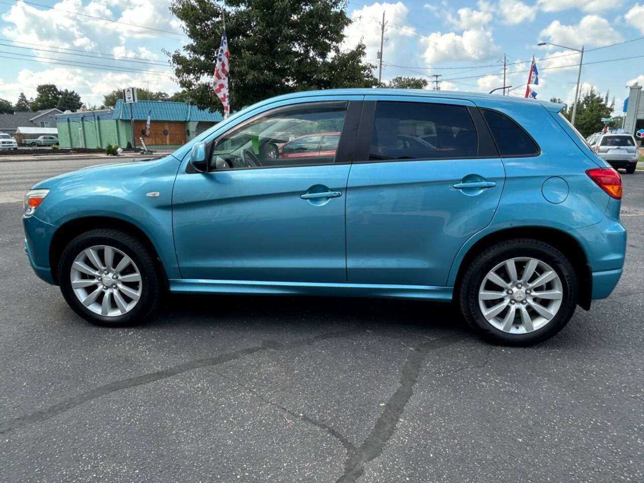 2011 Mitsubishi Outlander Sport for sale at Auto Shop in Wyoming, MI