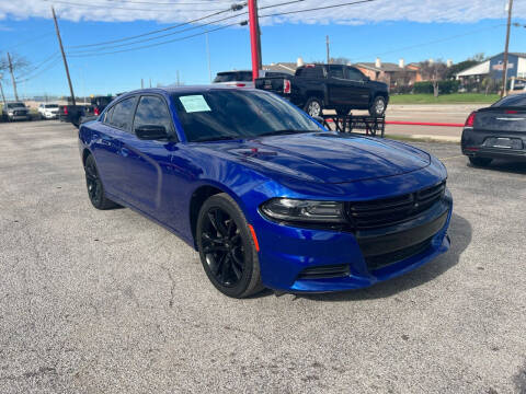 2018 Dodge Charger for sale at LLANOS AUTO SALES LLC - LEDBETTER in Dallas TX