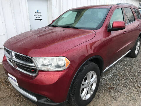 2013 Dodge Durango for sale at Simmons Auto Sales in Denison TX