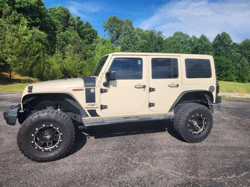 2012 Jeep Wrangler Unlimited for sale at CARS PLUS in Fayetteville TN