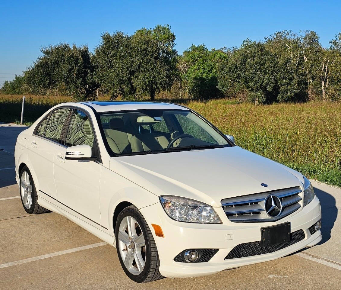 2010 Mercedes-Benz C-Class for sale at CAR MARKET AUTO GROUP in Sugar Land, TX