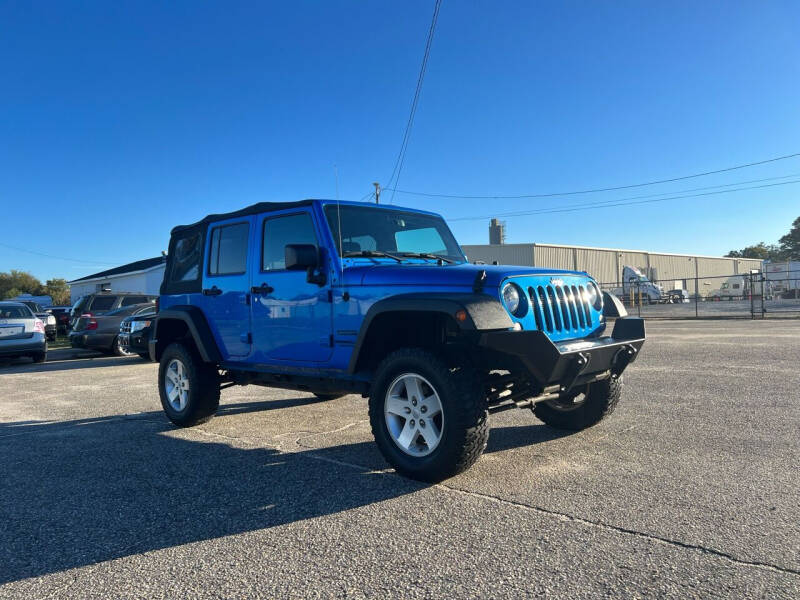 2015 Jeep Wrangler Unlimited for sale at Carworx LLC in Dunn NC