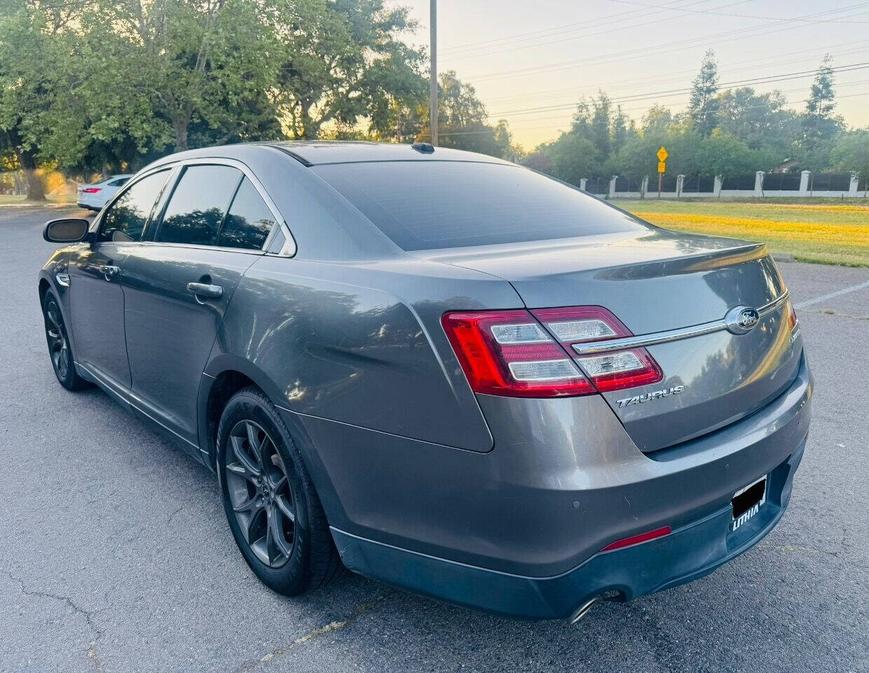 2013 Ford Taurus for sale at Two Brothers Auto Sales LLC in Orangevale, CA