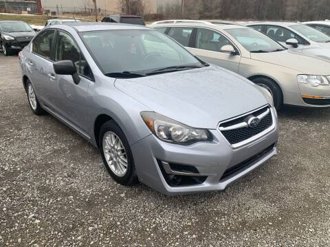 2015 Subaru Impreza for sale at SAVORS AUTO CONNECTION LLC in East Liverpool OH