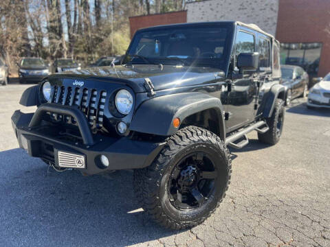 2014 Jeep Wrangler Unlimited for sale at Atlanta Unique Auto Sales in Norcross GA