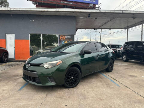 2016 Toyota Corolla for sale at P J Auto Trading Inc in Orlando FL