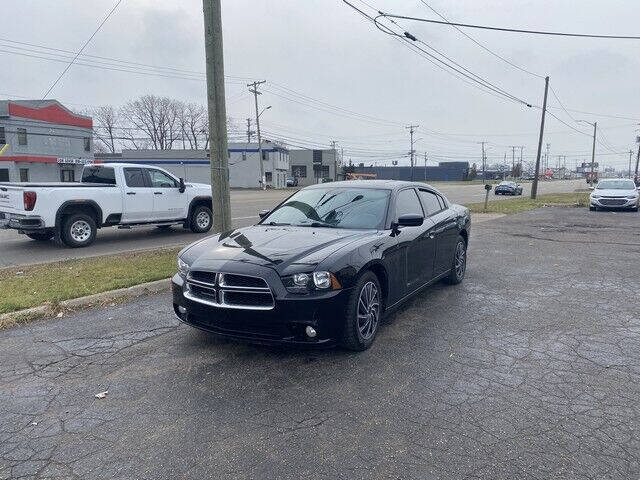 2013 Dodge Charger for sale at FAB Auto Inc in Roseville MI