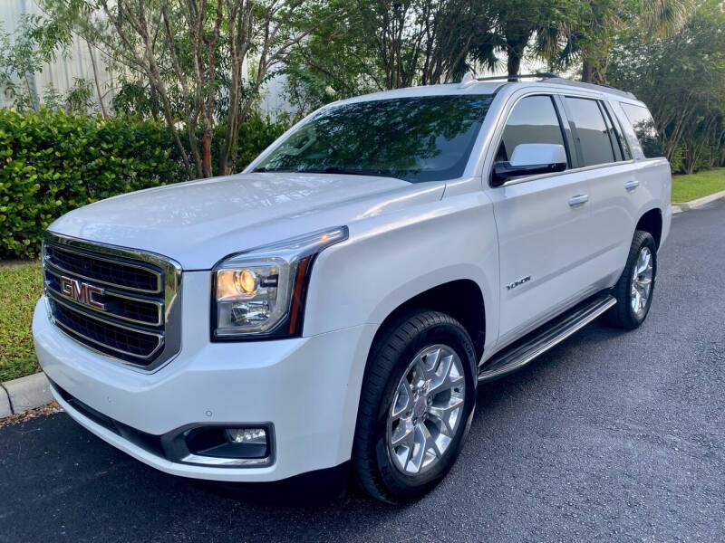 2017 GMC Yukon for sale at DENMARK AUTO BROKERS in Riviera Beach FL