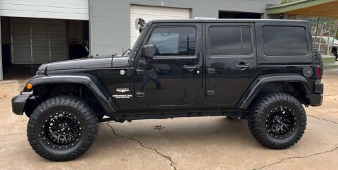 2013 Jeep Wrangler Unlimited for sale at Fisher Auto Sales in Longview TX
