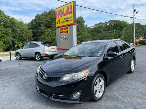 2012 Toyota Camry for sale at NO FULL COVERAGE AUTO SALES LLC in Austell GA