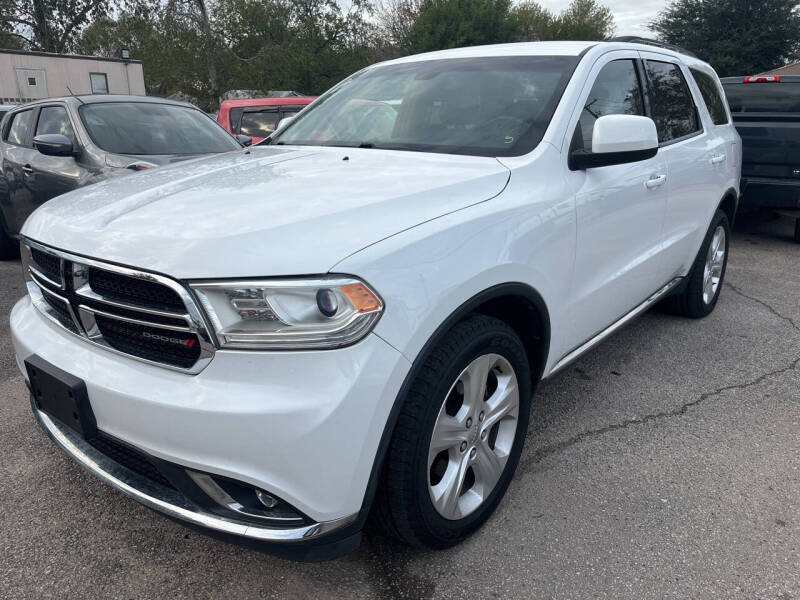 2014 Dodge Durango for sale at Memo's Auto Sales in Houston TX