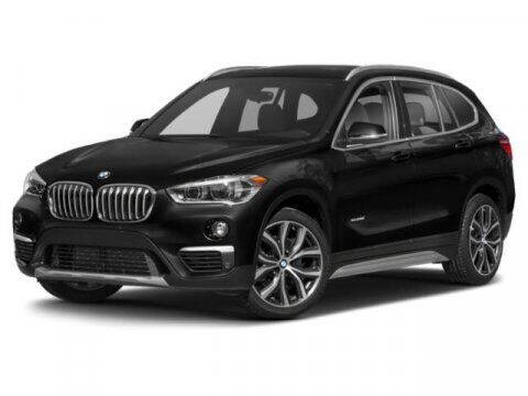 2018 BMW X1 for sale at HILAND TOYOTA in Moline IL
